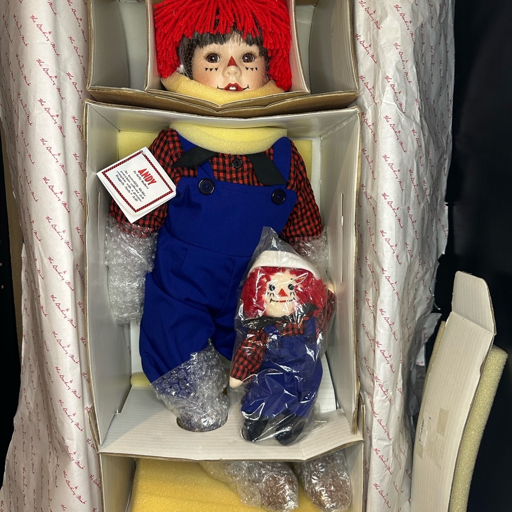 Vintage mint condition porcelain Raggedy Andy Doll with plush raggedy, Andy